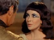 Cleopatra (Elizabeth Taylor) confronts Julius Caesar (Rex Harrison)
