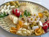 Variety of cheeses on serving platter