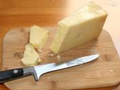 A wedge of Unpasteurised West Country Cheddar cheese, made in Somerset (with PDO.)