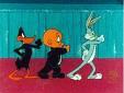 Daffy Duck, Elmer Fudd, and Bugs Bunny dance to a techno song with the aid of sticky bubble gum.