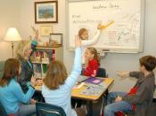 English: Virginia Beach, Va. (Jan. 17, 2007) - Guidance counselor Elizabeth Prince facilitates an Anchors Away program for children at Christopher Farms Elementary, Virginia Beach, Va. The program was created 10 years ago to help children with deployed pa