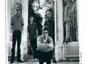 Oasis, 1997. L-R: Alan White, Paul McGuigan, Noel Gallagher, Paul Arthurs, and Liam Gallagher.