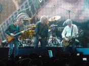 A reunited Led Zeppelin in December 2007 at The O 2 in London for the Ahmet Ertegün tribute show. From left to right: John Paul Jones, Robert Plant, and Jimmy Page. On drums is Jason Bonham, the son of the deceased John Bonham.