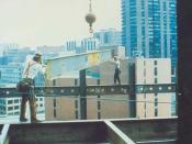 Construction workers at a considerable height without appropriate fall protection equipment.