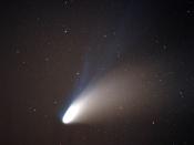 Comet Hale-Bopp. Author shot this image at Tierra del Sol in San Diego County in April, 1997. A telescope was used to guide the camera. The blue ion tail is clearly visible.
