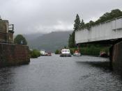English: Swinging into action at Fort Augustus The swing bridge opens up for pleasure craft on their way to the locks at Fort Augustus.