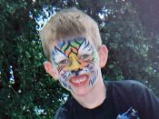 English: Child in Tiger face paint
