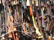 Pyre of smuggled weapons in Uhuru Gardens, Nairobi, Kenya. Original caption states, 