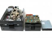 Floppy Disk Drives. Qume D/T 8, 8 inch drive, 1.2 MB. This drive was made in 1980. See Image:Floppy Disk Drive 8 inch.jpg Tandon TM 100-2A with IBM logo, 5 ¼ inch drive, 360 KB. This drive was made in 1983. See Image:IBM Floppy Drive With DOS.jpg Sony MPF