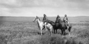 Three Piegan (Blackfeet) chiefs. Albumen print, 1900.