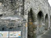 English: The Arcades A part of the western section of the city walls adjacent to Southampton Castle. Before the 100 Years' War with France, there were good houses and merchants shops along this part of the quay. However, they were attacked by the French i