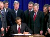 English: President Barack Obama signs the Tax Relief, Unemployment Insurance Reauthorization, and Job Creation Act of 2010 at the White House.