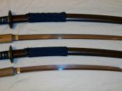 English: Antique Japanese (samurai) daisho consisting of matching koshirae, shirasaya, katana and wakizashi made by separate sword smiths.