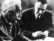 Albert Einstein (left) with J. Robert Oppenheimer (right) working on the Manhattan Project
