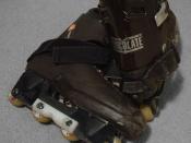 a pair of Edwards Chocolate aggressive inline skates