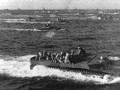 LVT-4s like these ferried French troops during Operation Camargue. Here, LVT-4s are pictured carrying American Marines to the beaches of Iwo Jima.