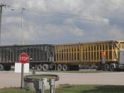 English: truck and trailers hauling cane to a cane sugar mill in Florida, USA