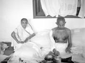 Kasturba with Gandhi reading