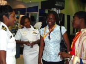 US Navy 070708-N-2888Q-005 Lt. Ladonna Gordon (left), and Lt. Kathryn S. Wijnaldum, Recruiters in the Detroit area, talk with two high-school seniors at the 98th National Association for the Advancement of Colored People (NAACP