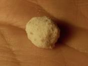 English: A rock of MDMA weighing 300 milligrams