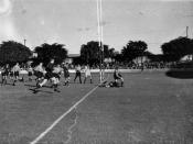 English: Rugby Union match between Queensland and New South Wales, April 1938 The referee is blowing his whistle as a try is scored.