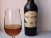 A glass of amontillado sherry, with olives