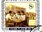 Three Chinese men playing board game outdoors