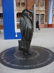 Statue (2007) of Sir John Betjeman at St Pancras Station.