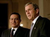 English: President George W. Bush and Egyptian President Mohammed Hosni Mubarak address the media in Cross Hall at the White House March 5. 