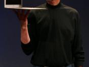 English: A cropped version of :Image:SteveJobsMacbookAir.JPG. Steve Jobs holding a MacBook Air (at MacWorld Conference & Expo 2008 - Moscone Center - San Francisco, CA)