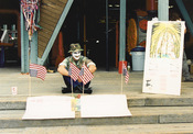 A Vietnam veteran in facepaint sits vigil early on in the PeaceWorks Park vigil, an anti-war protest action that occurred in Gas Works Park, Seattle, Washington, U.S. beginning Sunday, August 26, 1990 and carrying on through the end of the Gulf War.