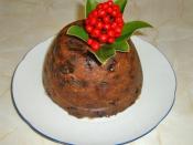 Christmas pudding decorated with skimmia rather than holly.