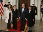 US President George W. Bush and Mrs. Laura Bush welcome Jordan's King Abdullah II and Queen Rania upon their arrival to the White House for a social dinner Tuesday evening, March 6, 2007.