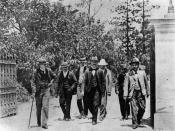 English: After the swearing in of the Dawson ministry of the Labor Party Brisbane, Queensland Hon. Anderson (Andrew) Dawson's ministry leaving Government House after the swearing in ceremony. All are members of the Australian Labour Party. The men are dre