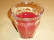 A small glass of Sanguinello blood orange juice.