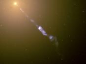 A jet of particles is being emitted from the core of the elliptical radio galaxy M87.
