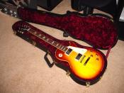 2005 Gibson '58 Reissue Les Paul in Iced Tea in original case. The reissue 1958 and 1959 Gibson Les Paul are among the most sought after new guitars on the market, with prices ranging from $2,000-$5,000. The original 1959 Les Paul is often regarded as the
