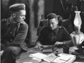 A screenshot from the film with actor Lew Ayres (right).