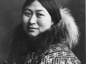 Photograph of an Alaska Native woman wearing a coat with a fur collar. Original title was 