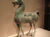 A Chinese bronze horse statue with a lead saddle, from the Han Dynasty (202 BC – 220 AD).