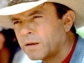 Sam Neill as his character Alan Grant in the first Jurassic Park film
