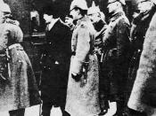 Soviet delegation with Leon Trotsky greeted by German officers at Brest-Litovsk, press photo.