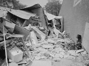 Photograph showing the wreckage of a bomb explosion near the Gaston Motel where Martin Luther King, Jr., and leaders in the Southern Christian Leadership Conference were staying during the Birmingham campaign of the Civil Rights movement.