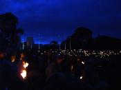 Australian War Memorial, Canberra, 25 April 2005 - ANZAC Dawn Service - 90th anniversary of ANZAC Day. The lightening dawn, with some 20,000 people gathered at the forecourt of the AWM. The trumpeter is seen on the rampart at the front of the AWM having j