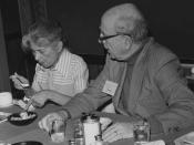 This photograph depicts Dr. Alexander D. Langmuir seated to the right of Ms. Ida Sherwood during an Epidemic Intelligence Service (EIS) luncheon.