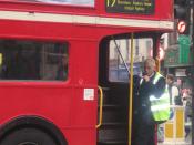 Traditional British open-platform Routemaster bus, operated with a conductor