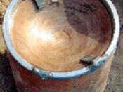Improvised Explosive Device in Iraq. The concave copper shape on top is an Explosively Formed Penetrator.