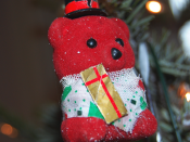 A photo of a bear decoration for a Christmas tree.