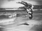 Peggy Bacon in mid-air backflip, Bondi Beach, Sydney, 6/2/1937 / by Ted Hood
