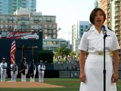 English: SAN DIEGO (July 20, 2009) Lt. Joselyn C. Mercado, an obstetrician/gynecologist resident assigned to Naval Medical Center San Diego, sings the national anthem at Petco Park in San Diego, Calif. before a baseball game between the Padres and the Flo